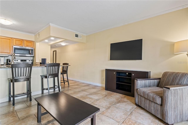 2506 N Rocky Point Dr Unit 272, Tampa, FL 33607 - living area with crown molding and baseboards