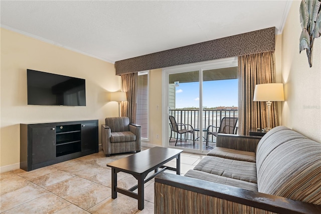 2506 N Rocky Point Dr Unit 272, Tampa, FL 33607 - living area featuring crown molding, baseboards, and a water view