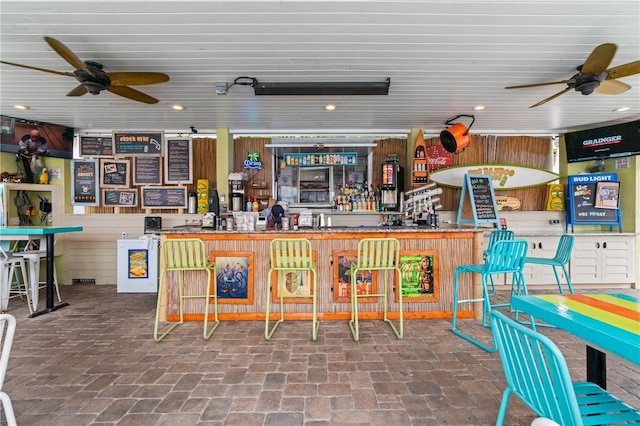 2506 N Rocky Point Dr Unit 272, Tampa, FL 33607 - bar with ceiling fan, brick floors, and recessed lighting