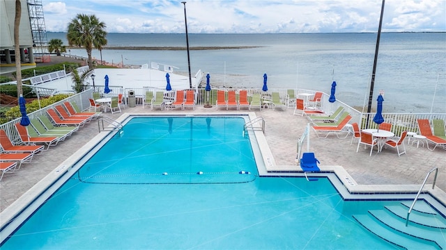 2506 N Rocky Point Dr Unit 272, Tampa, FL 33607 - community pool with a water view and a patio area