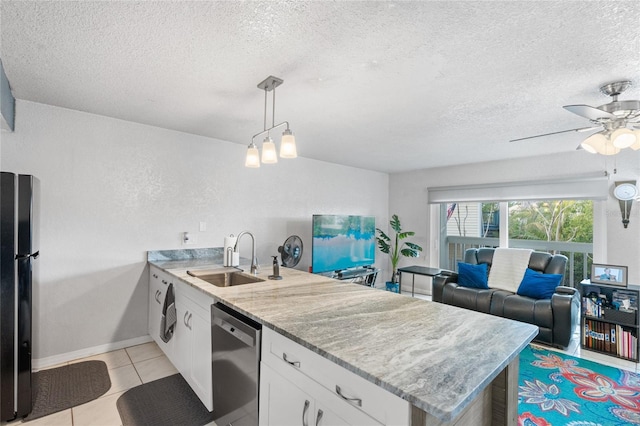 kitchen with white cabinetry, black fridge, dishwasher, pendant lighting, and sink