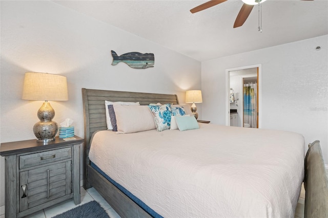 tiled bedroom with ceiling fan