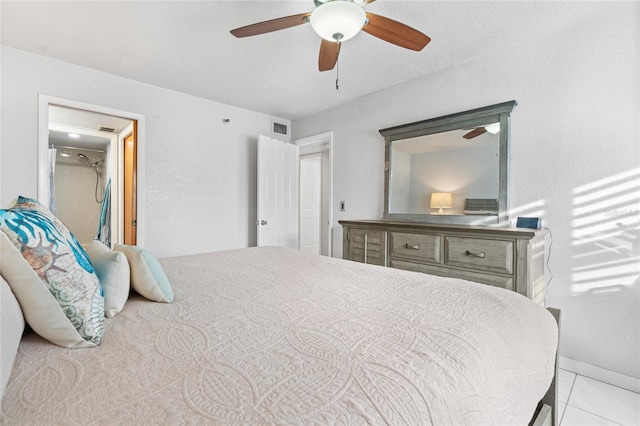 tiled bedroom featuring ceiling fan