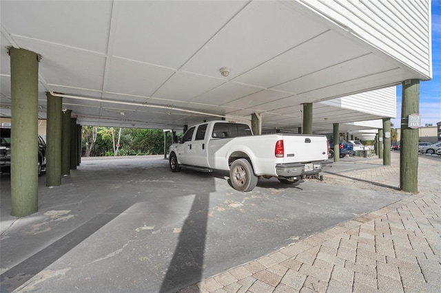 garage featuring a carport