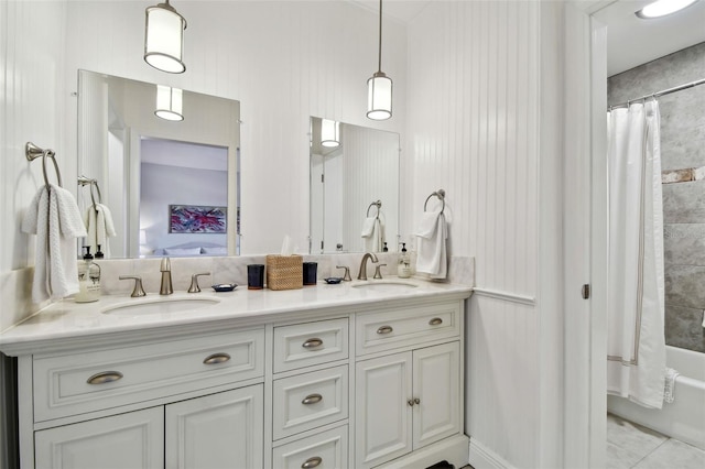 bathroom featuring vanity and shower / bath combo