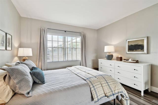 bedroom featuring dark hardwood / wood-style floors