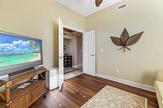 living area with dark wood-type flooring