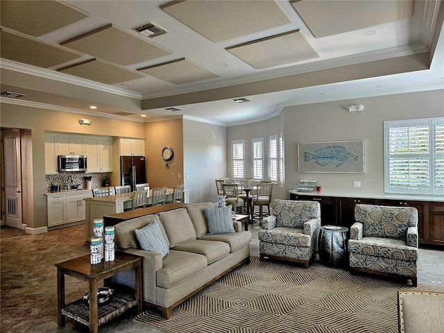 living room with a wealth of natural light and ornamental molding