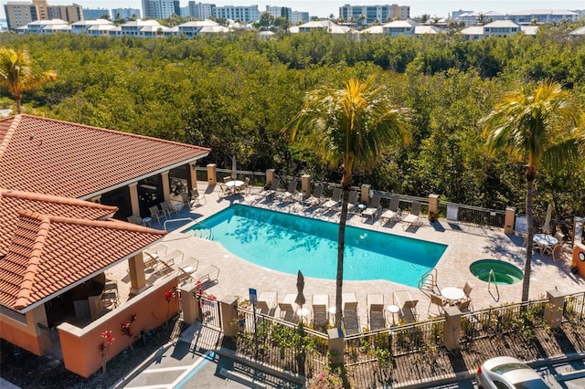 view of swimming pool with a patio area