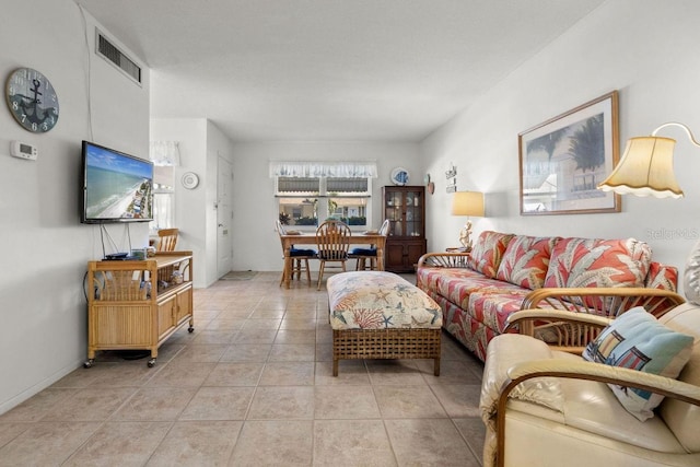 living room with light tile patterned floors