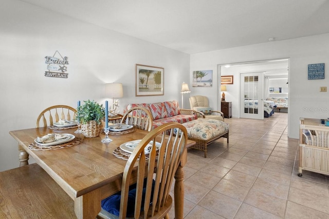 tiled dining area with french doors