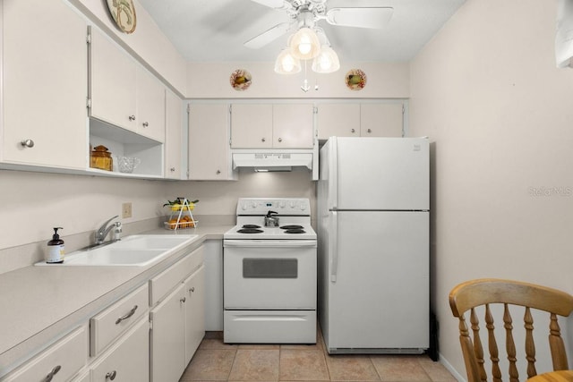 kitchen featuring sink, white cabinets, light tile patterned floors, ceiling fan, and white appliances