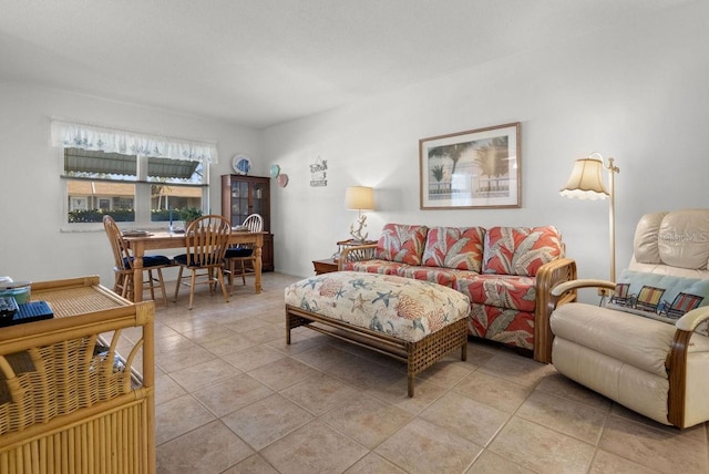 living room with light tile patterned floors