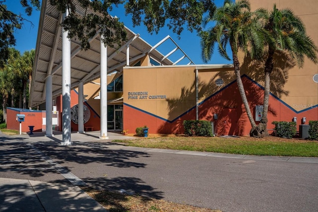 view of building exterior featuring central AC unit