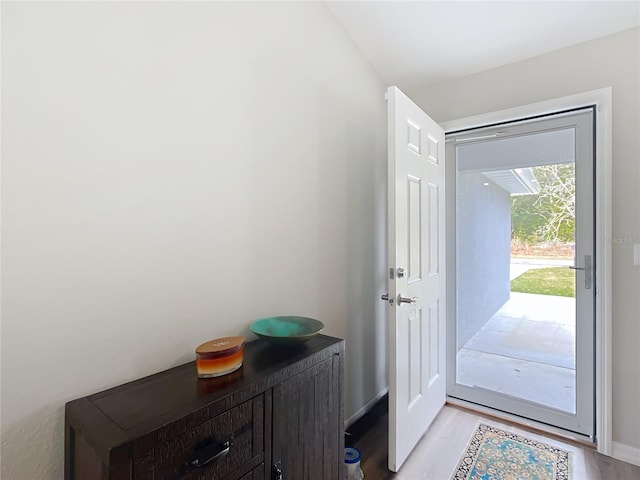 doorway featuring light hardwood / wood-style flooring