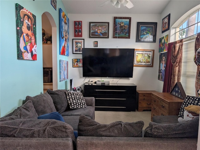 living room featuring ceiling fan and carpet floors