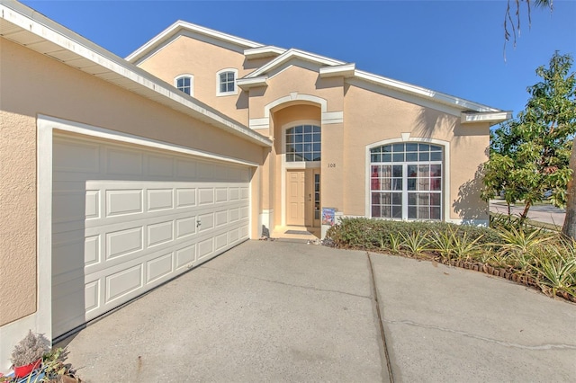 view of front of home with a garage