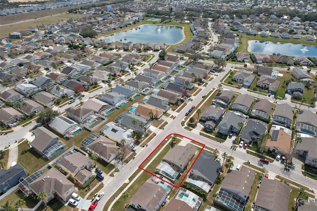 drone / aerial view featuring a water view