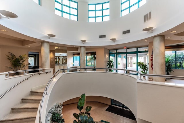 stairway with a high ceiling