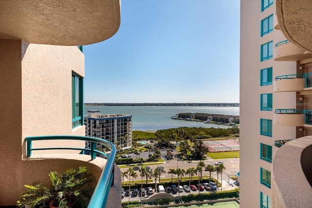 balcony featuring a water view