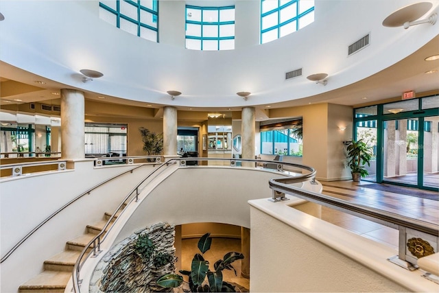 stairs featuring tile patterned flooring