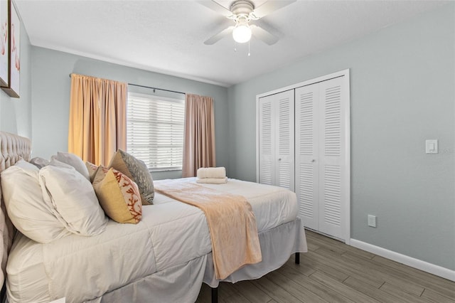 bedroom with ceiling fan, a closet, and light wood-type flooring