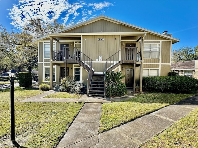 view of front of home with a front yard