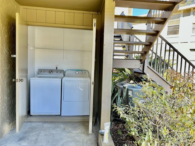 washroom with separate washer and dryer