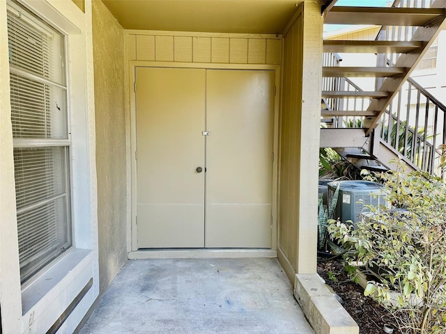 property entrance with cooling unit