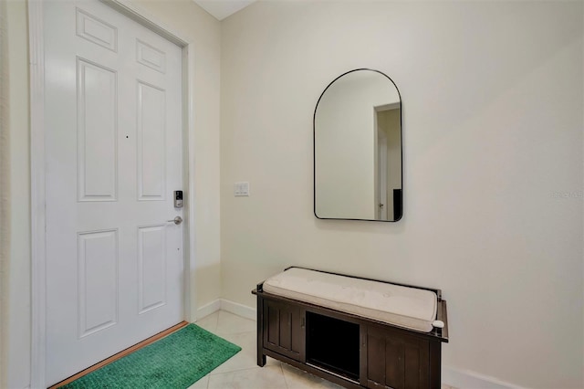 foyer with light tile patterned floors