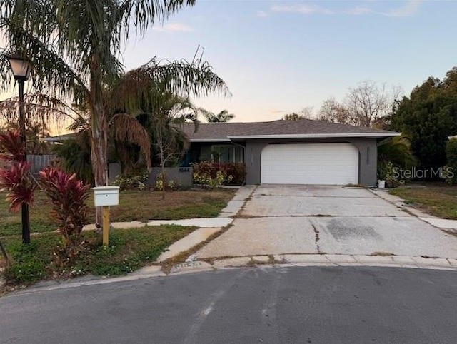 view of front of property with a garage