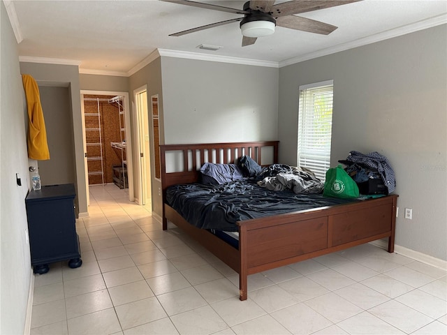 tiled bedroom featuring ceiling fan, connected bathroom, and ornamental molding