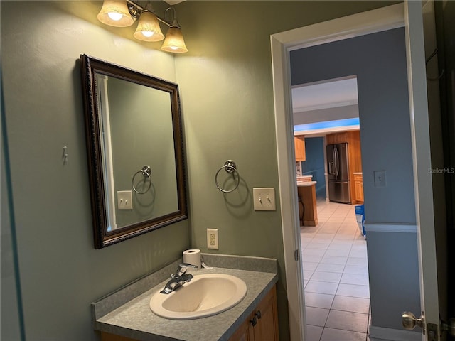 bathroom featuring tile patterned floors and vanity