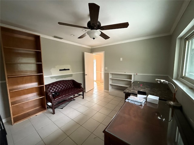 interior space with ceiling fan and ornamental molding