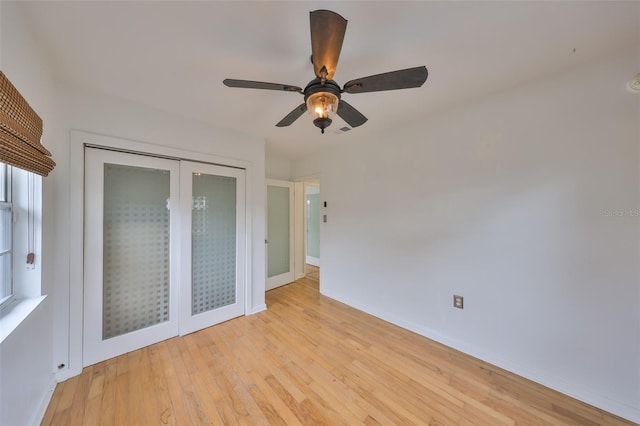 unfurnished bedroom with a closet, ceiling fan, and light hardwood / wood-style floors