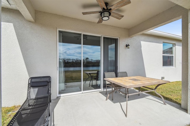 view of patio with ceiling fan