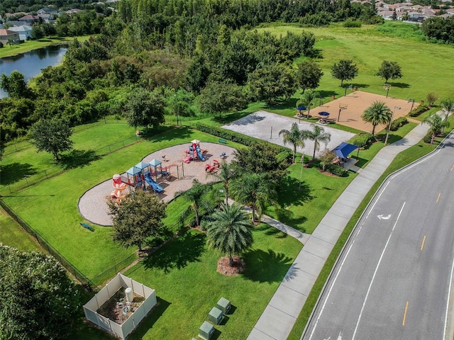 birds eye view of property featuring a water view