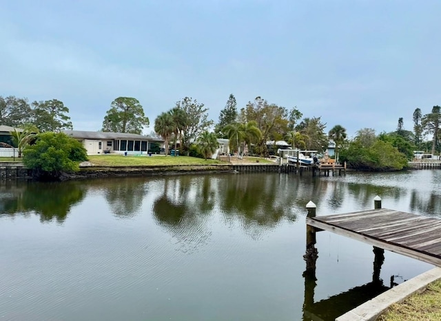 dock area featuring a water view