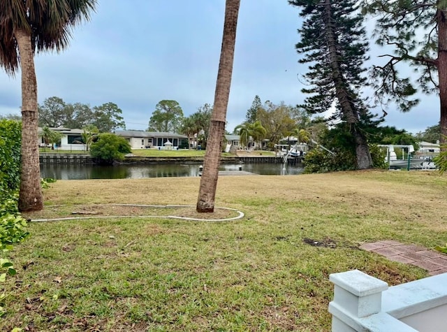 view of yard with a water view