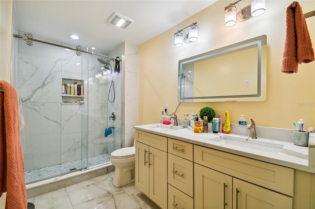 bathroom featuring toilet, walk in shower, and vanity