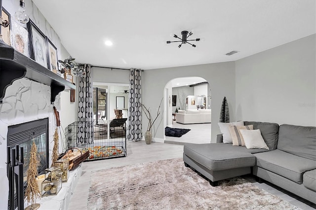 living room featuring a fireplace