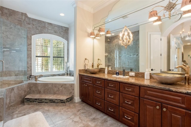 bathroom with ornamental molding, shower with separate bathtub, a notable chandelier, and vanity