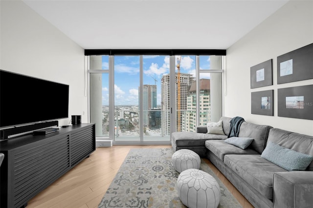 living room featuring expansive windows and plenty of natural light