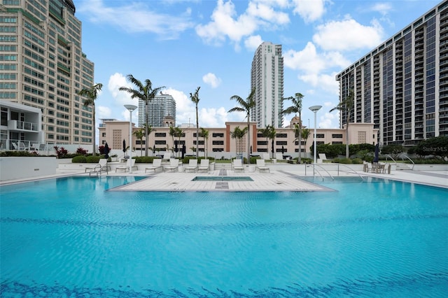 view of swimming pool featuring a patio