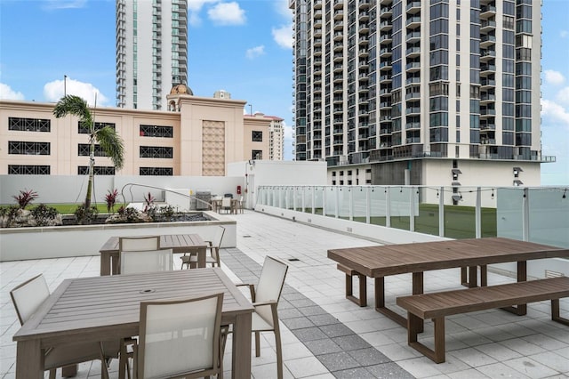 view of home's community with a patio area