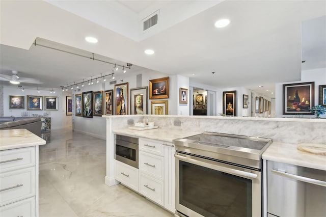 kitchen featuring recessed lighting, visible vents, open floor plan, light countertops, and stainless steel electric stove