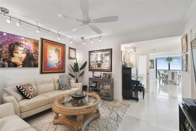 living area featuring ornamental molding, a ceiling fan, and track lighting