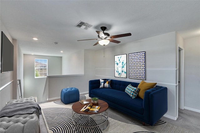 living room with ceiling fan, recessed lighting, carpet floors, visible vents, and baseboards