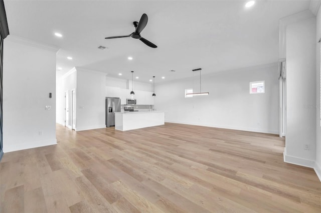 unfurnished living room with ceiling fan, light hardwood / wood-style floors, and ornamental molding