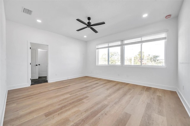 unfurnished bedroom featuring ceiling fan and light hardwood / wood-style floors